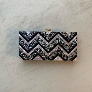 Black and mauve acrylic glitter evening clutch, gold chain and latch